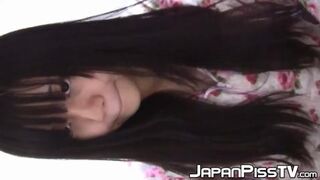 Japanese XXX Babe Pissing And Masturbating With Her Cat