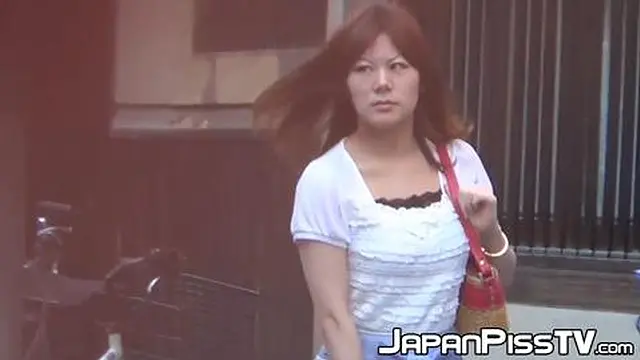 Japanese woman seeks private🤫 moment in crowded public area