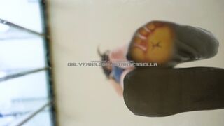 Giantess girl puts shrunken slave in her latex shoes/socks