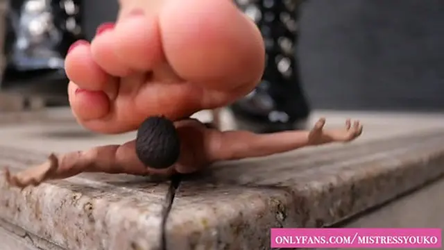 Japanese giantess dominates small man in intense scene