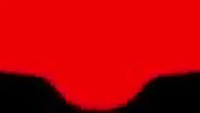 Her kitchen chore heats her up &mdash;  she toys with a carrot alone